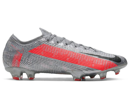 Gray and red soccer cleat on a white background
